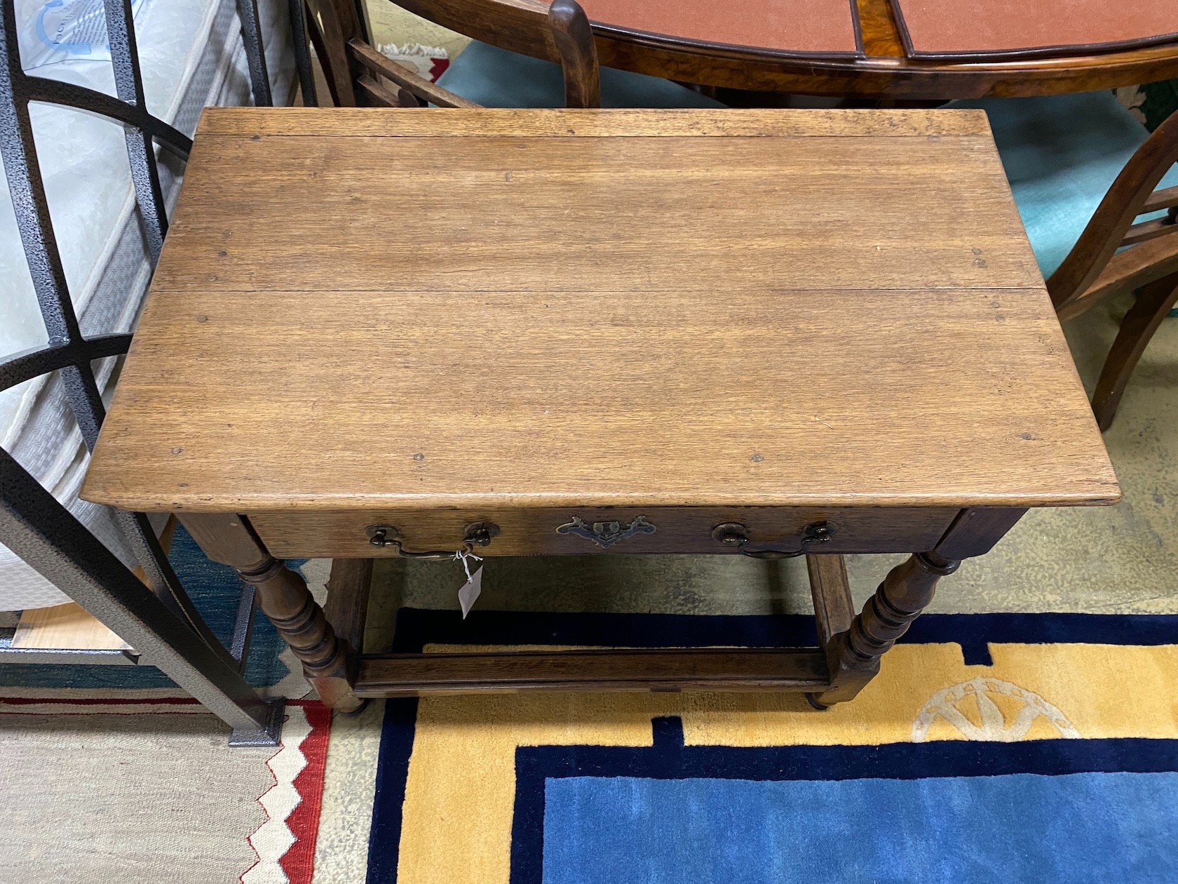 An 18th century oak side table, width 85cm, depth 49cm, height 70cm